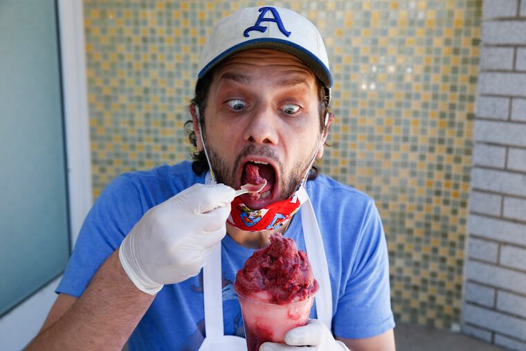 Chris D'Emilio of D’Emilio’s Old World Ice Treats in South Philadelphia, enjoys his Blueberry Guava Pennsport Punch water ice on May 31, 2020.