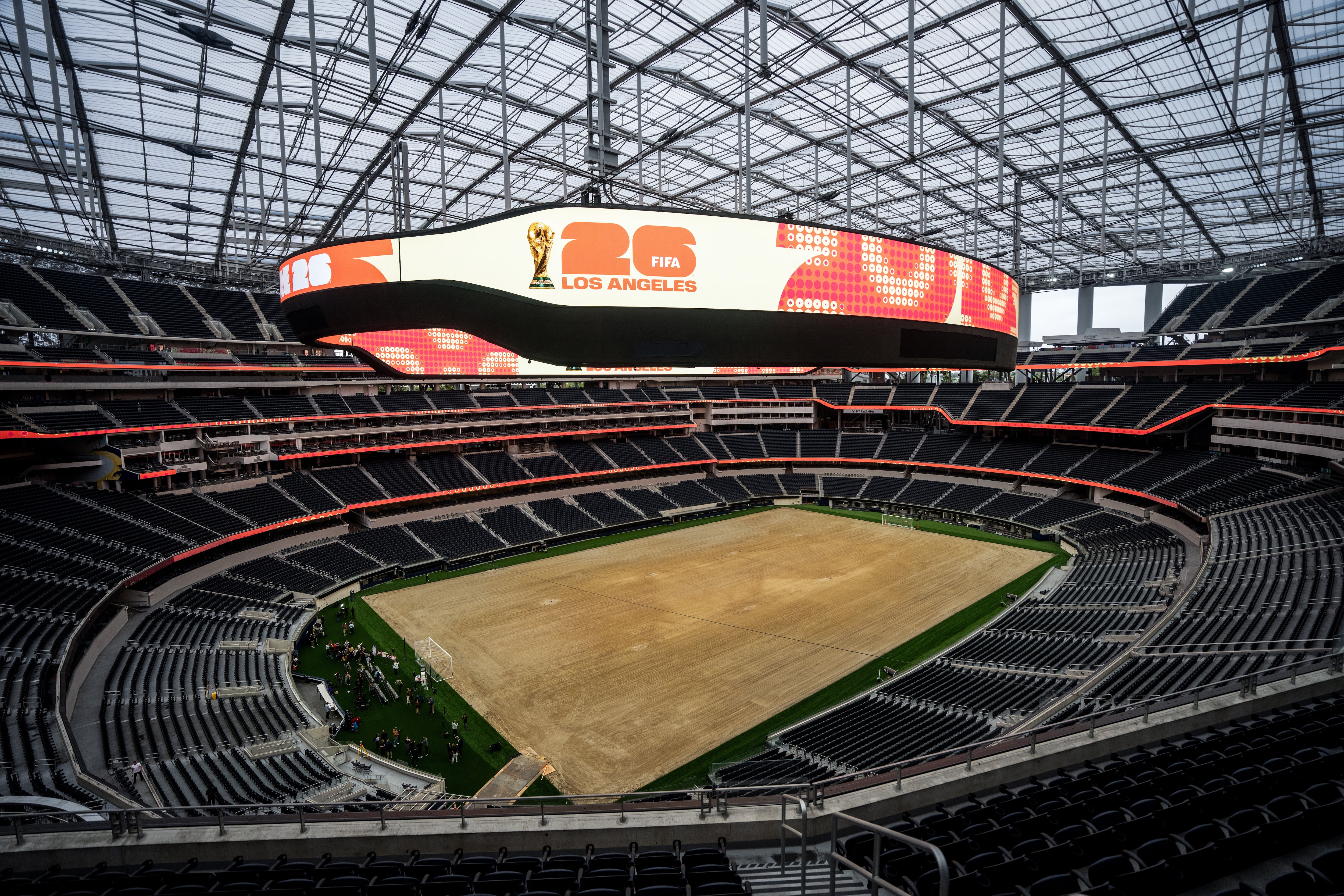 Stadium workers near Los Angeles vote to authorize a strike days before the World Cup begins
