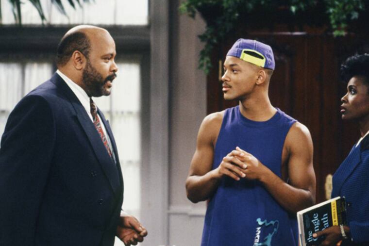 This photo provided by NBC shows, from left, James Avery as Philip Banks, Will Smith as William "Will" Smith, and Janet Hubert as Vivian Banks, in episode 7, "Def Poet's Society" from the TV series, "The Fresh Prince of Bel-Air." Avery, 65, the bulky character actor who laid down the law as the Honorable Philip Banks has died. Avery's publicist, Cynthia Snyder, told The Associated Press that Avery died Tuesday, Dec. 31, 2013. (AP Photo/NBC, Ron Tom)