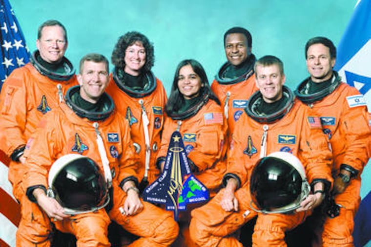 (from left, front row) Rick Husband, Kalpana Chawla, William McCool; (back row) David Brown, Laurel Clark, Michael Anderson and Ilan Ramon. A hole in the craft's wing allowed in superhot gases and it broke apart during reentry Feb. 1, 2003, killing the seven aboard.