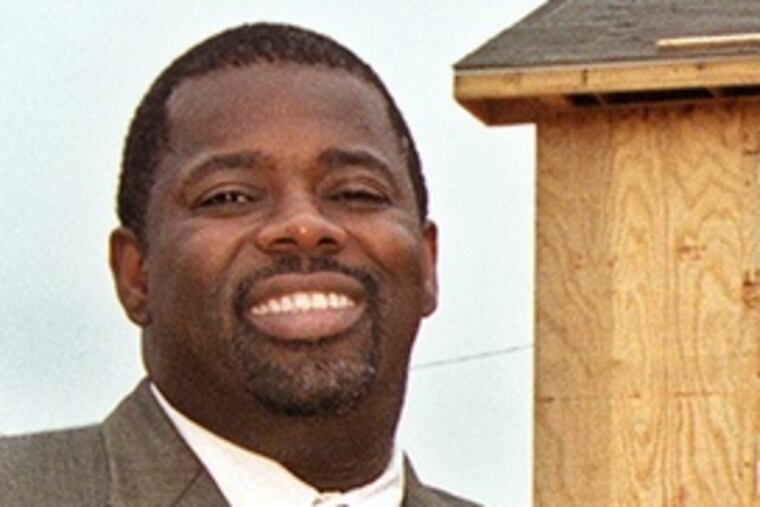 Blowing up old buildings like Mantua Hall, at left, means "fewer slips and falls on cracks in the old sidewalks," said PHA chief Carl Greene.