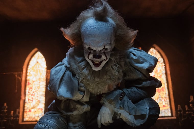 This image released by Warner Bros. Pictures shows Bill Skarsgard in a scene from “It.”