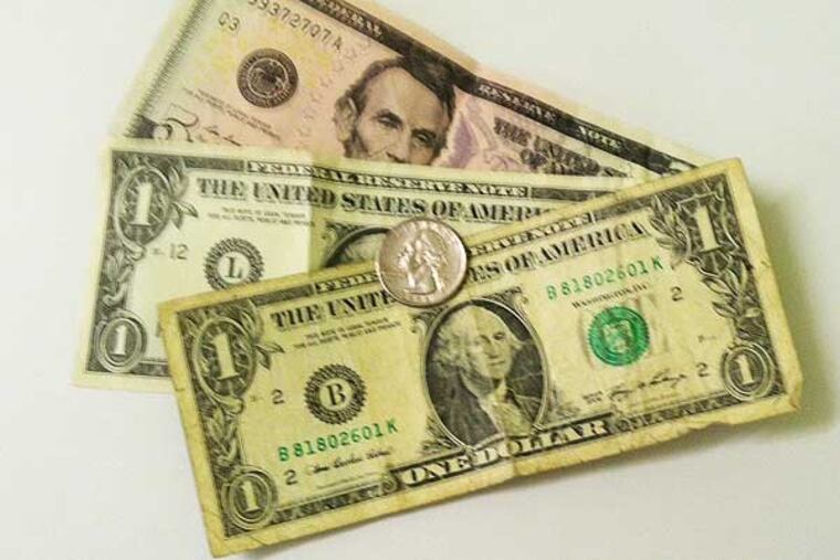 $7.25 is the current federally-mandated minimum wage in the U.S. (Dave Ralis / Philly.com)