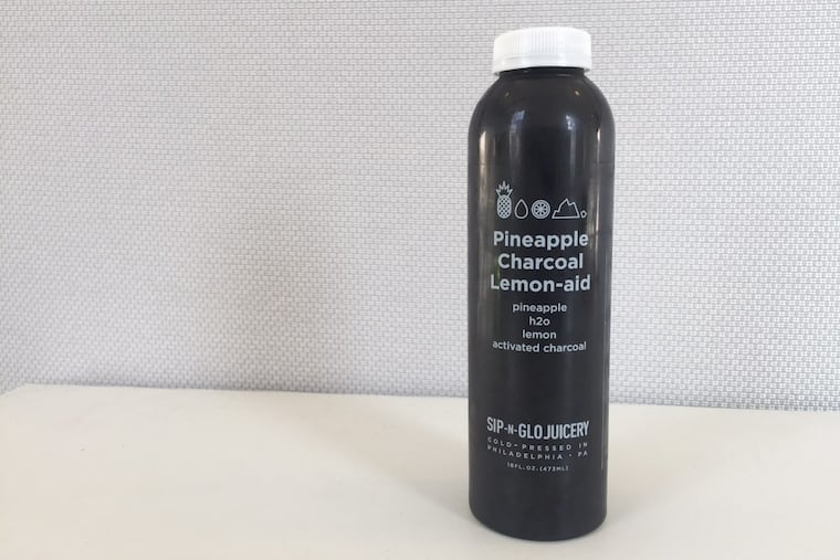 Pineapple charcoal lemon-aid from Sip-N-Glo.