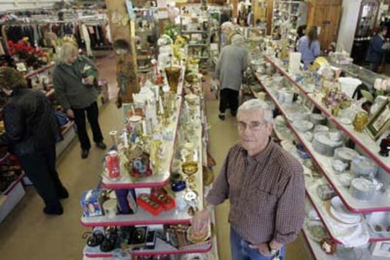 Al Chagan at the thrift store in Hatboro. At 67, he has no plans to retire. (Bonnie Weller / Staff Photographer)