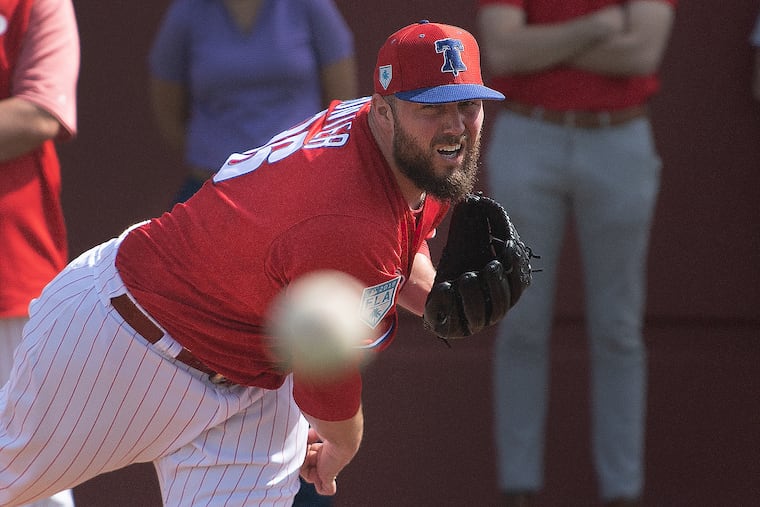 Tommy Hunter in healthier times, throwing at spring training in February.