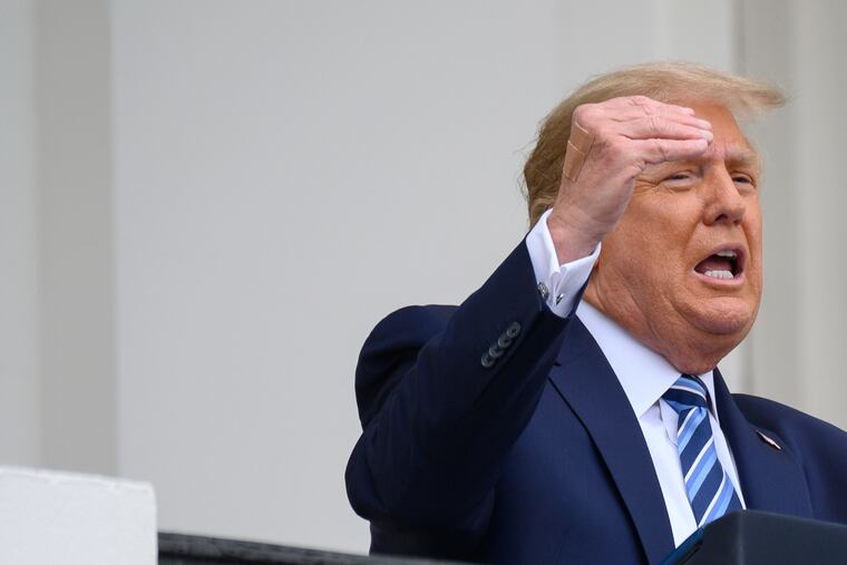 A bandage is seen on President Donald Trump's hand while speaking from the Truman Balcony of the White House in Washington, D.C., on Saturday, Oct. 10, 2020. (Erin Scott/Pool/Sipa USA/TNS)