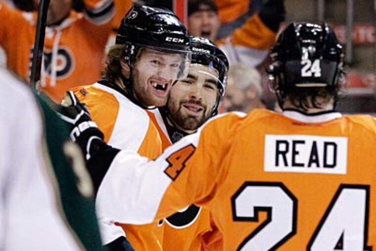 The Flyers selected Sean Couturier with the eighth-overall pick in last year's NHL draft. (Matt Slocum/AP)