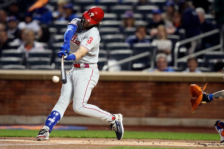 Harper bats in the first inning against the New York Mets on Friday, Sept. 6, 2019. He injured his hand and left the game in the third inning.