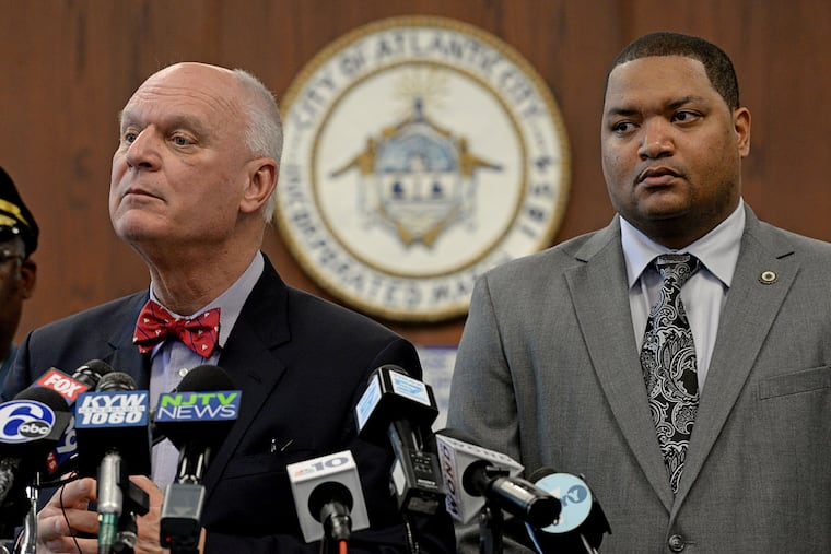 Mayor Don Guardian (left) and Council President Marty Small discuss the impasse. “He’s absolutely shutting us down,” Guardian said of Gov. Christie, who said a full state takeover was the only answer.