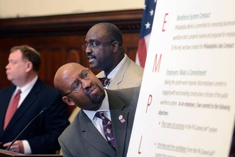 Mayor Michael Nutter examines the visual aids as Philadelphia Works CEO Mark Edwards (rear, right) speaks at a City Hall press conference October 22, 2013 for businesses and the City of Philadelphia to sign the first-ever “Philadelphia Jobs Compact." At left, rear is William J.T. Strahan, executive VP for human resources at Comcast. The compact is a partnership between Philadelphia Works and employers to utilize the public workforce system to fill open positions. Philadelphia Works is the city’s leading workforce development organization, connecting employers to a skilled workforce and helping individuals develop the skills needed to thrive in the workplace. This comes as the monthly jobs report for Sept., delayed by the govt shutdown shows unemployment falls to 7.2 percent, but only 148,000 jobs were created, as more people stop looking for work. ( TOM GRALISH / Staff Photographer )