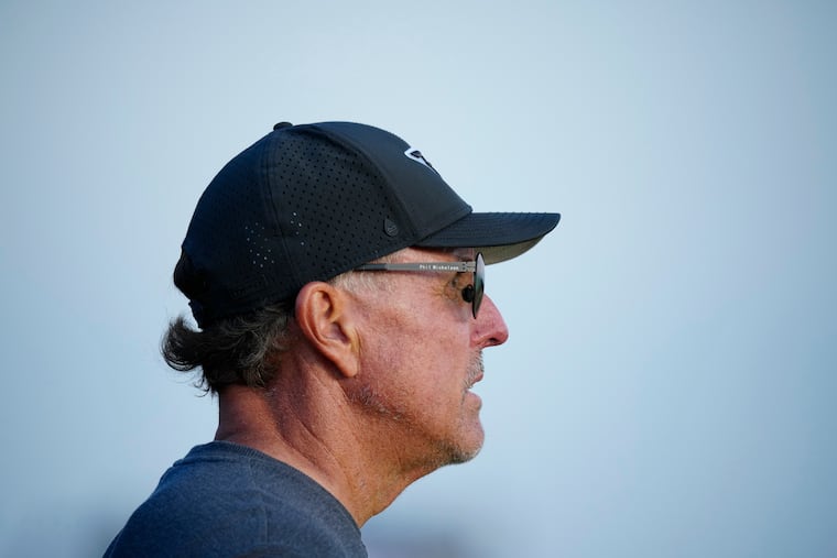 United States' Phil Mickelson waits to play on the 17th tee on the first day of the British Open Golf Championships at the Royal Liverpool Golf Club in Hoylake, England, in July.