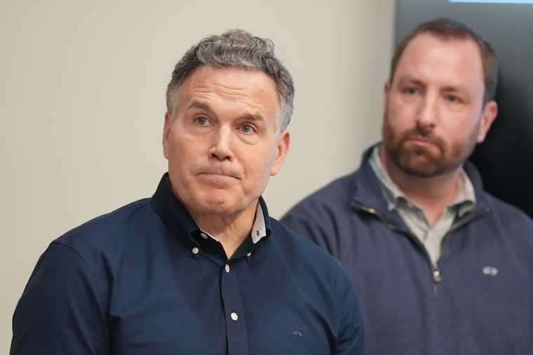 Sen. Dave McCormick (left) tours Syzygy Integration in Conshohocken Monday with company president and founder Wesley Mitchell.