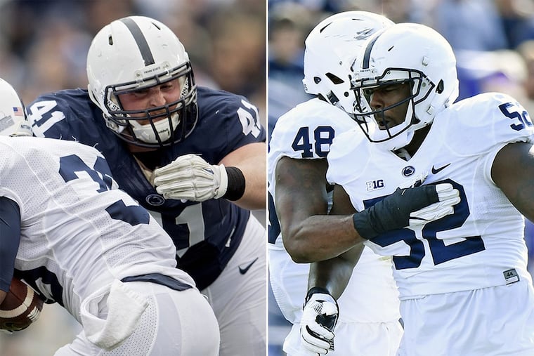Penn State defensive tackles (from left) Parker Cothren and Curtis Cothran. AP File Photos