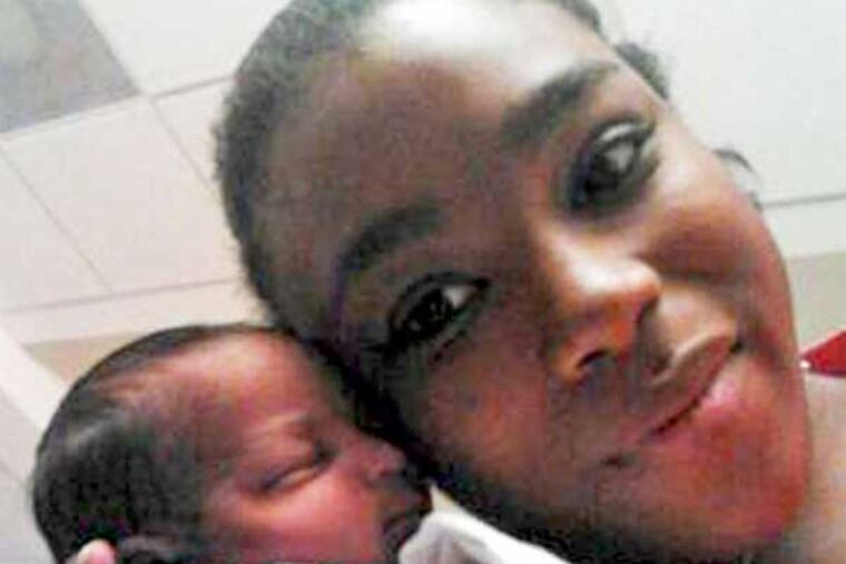 Jade Nelson, 22, with her newborn, Dillen Anthoney Whitest, who remains at Pennsylvania Hospital.