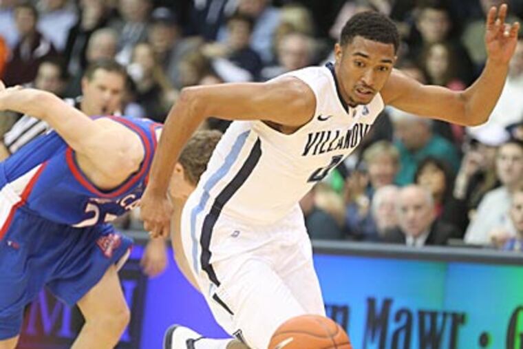 Darrun Hilliard races for a loose ball in Villanova's 73-52 win over American. (Charles Fox/Staff Photographer)