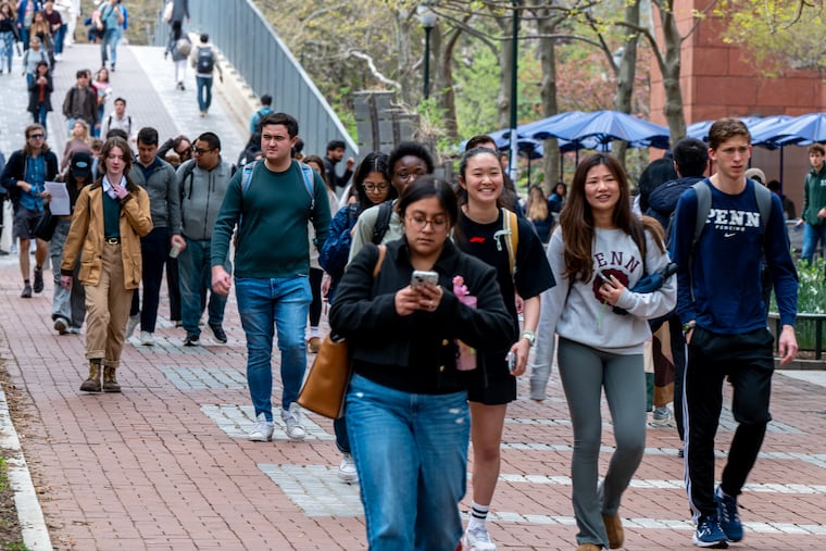 University of Pennsylvania students walk on Locust Walk on Penn's campus. Penn said no to signing the compact offered by President Donald Trump's administration.