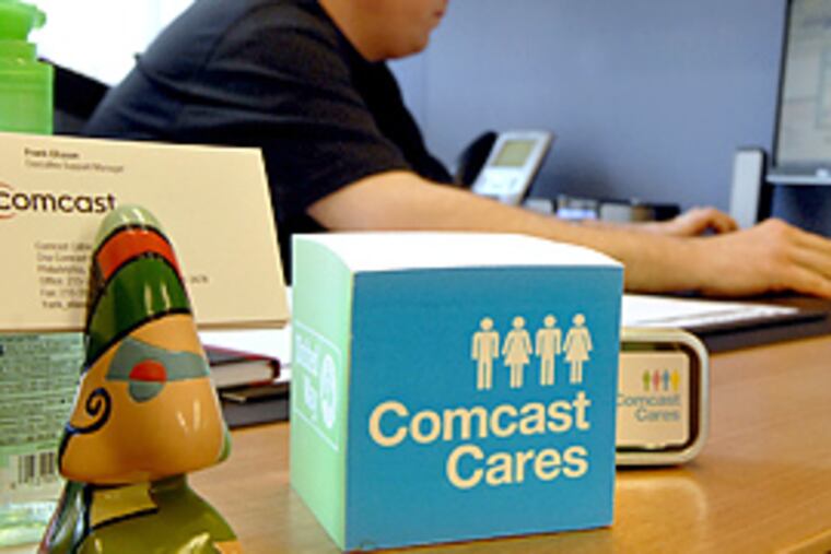 Frank Eliason's assignment is very specific: If someone has a Comcast problem and is talking about it online, he contacts that person and offers help. (Tom Gralish/Inquirer)