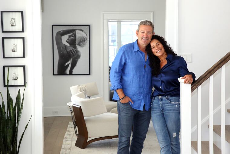 Andy and Lenni Sue Perry in the foyer of their home in Margate. The house is mostly white, but she made sure all fabrics were washable.