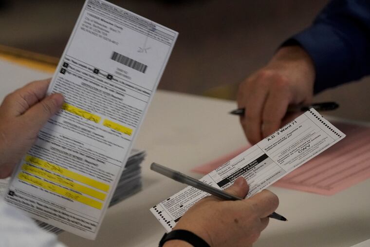 Workers count Milwaukee County ballots on Election Day at Central Count in Milwaukee. President Donald Trump's campaign has paid $3 million for a recount of two heavily Democratic Wisconsin counties, saying Wednesday, Nov. 18, 2020, that they were the site of the "worst irregularities" although no evidence of wrongdoing has been presented and state elections officials have said there was none.