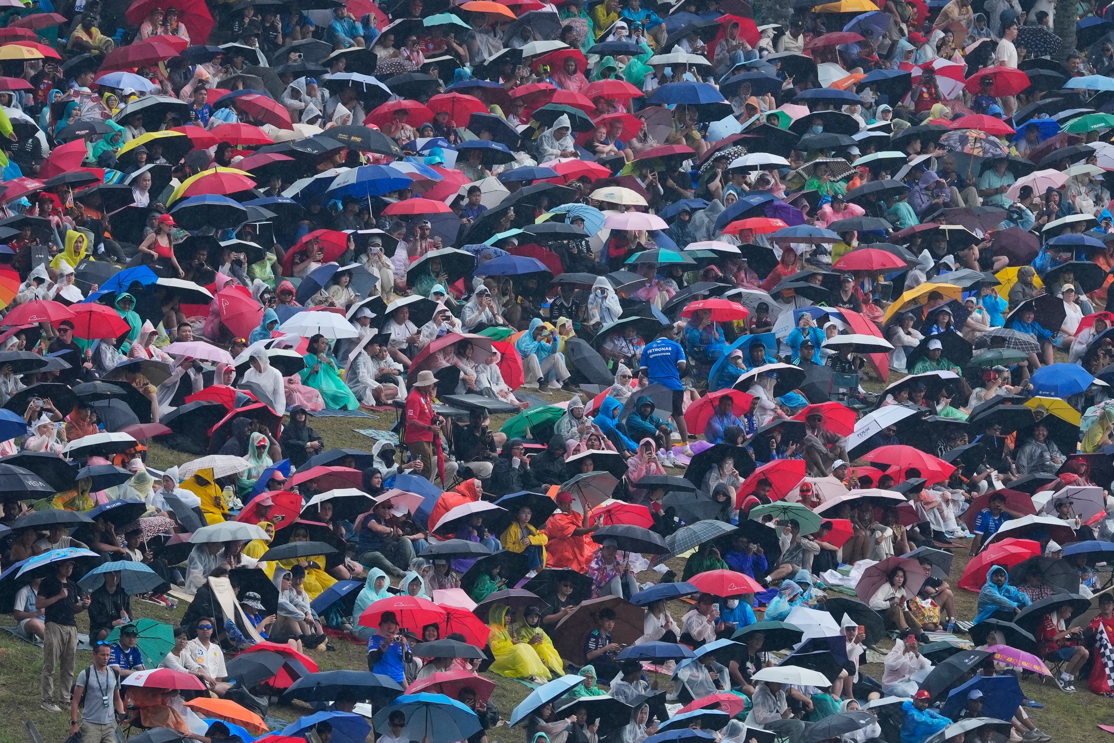 Heavy rain delays start as F1's Bahrain GP takes place in Malaysia