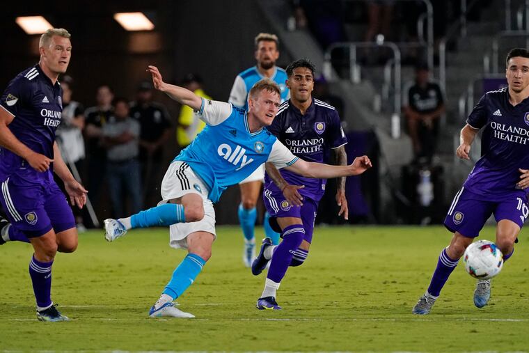 Karol Swiderski (center) has 10 goals and 4 assists for Charlotte FC this year.