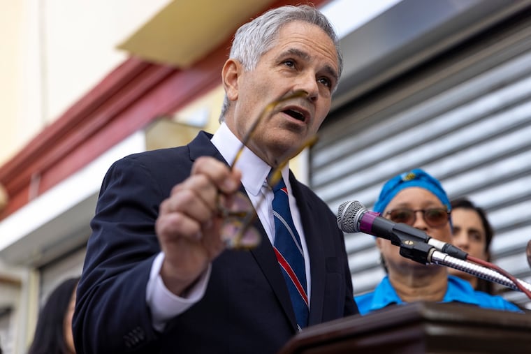 District Attorney Larry Krasner speaks in front of press and community members during a press conference in West Philadelphia on July 22, 2021.