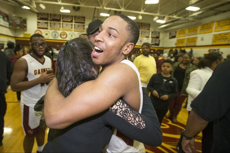 Jared Latane, center, became Haddon Heights all-time leading scorer during his team’s 80-78, overtime victory over Pleasantville in the first round of South Jersey 2 tournament in boys’ basketball on Tuesday.