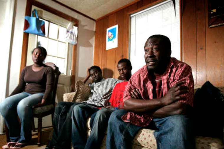 Family members (from right) Peterson Massena; sons Jean, 22, and Ephraim, 16; and daughter Sophilee, 19, were sponsored by Peterson's brother and mother, who live in Delaware County.