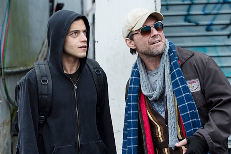 (L-R) Rami Malek as Elliot and Christian Slater as Mr. Robot in "Mr. Robot." (Photo by: David Giesbrecht/USA Network)