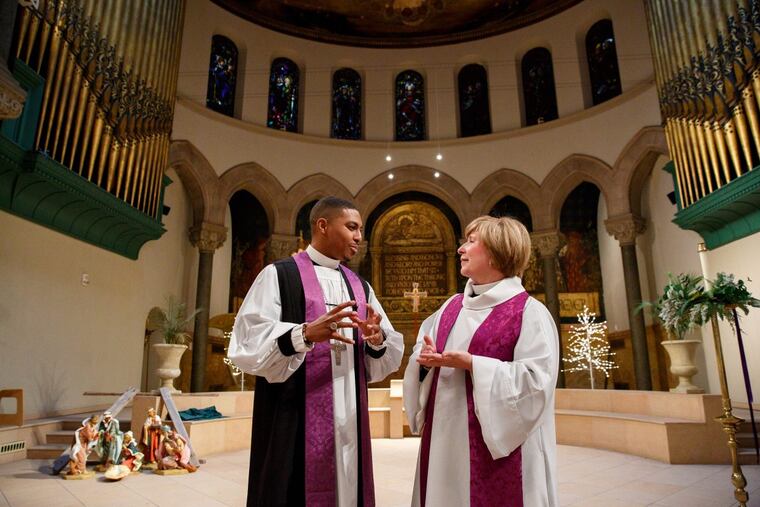 Rev. Nicolas O’Rourke, left, and Cathedral Dean Judith Sullivan, right, at the Episcopal Cathedral, where a jazz-infused Watch Night for Racial Justice event will take place the afternoon and evening of New Year’s Eve.