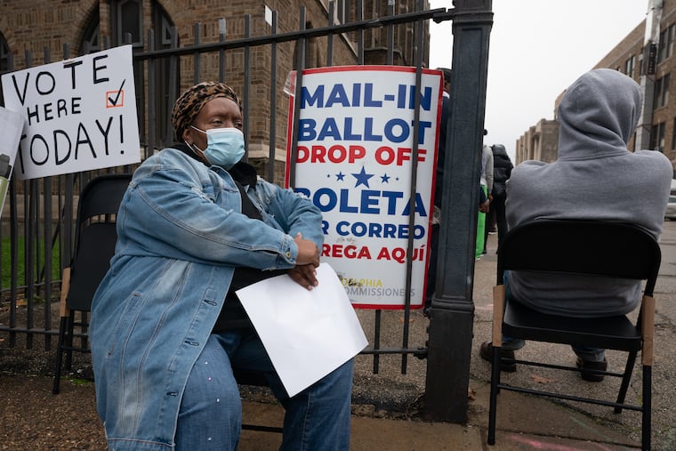 Eileen Martin waits to vote at Tilden Middle School at 66th and Elmwood Ave., in Philadelphia, on Oct. 26. At the time that this photograph was taken Eileen Martin had been waiting for three hours.