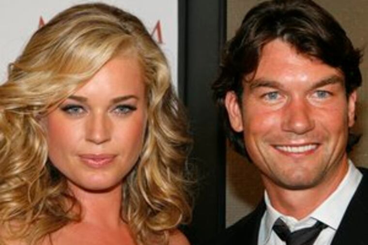 Rebecca Romijn, Jerry O'Connell, now woman and husband. (See "Romijn off the market.")