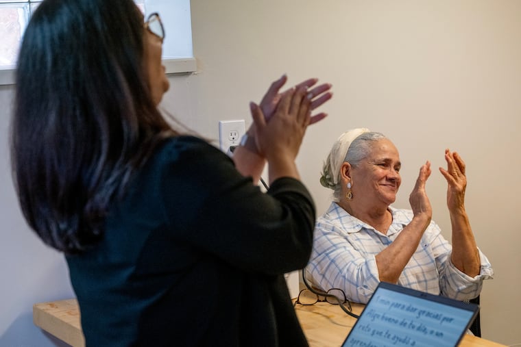 Client Balbina Rodriguez (right) participates in a workshop at the Hispanic Women’s Resource Center in Camden led by staff member Andreina Pardo (left) Thursday, June 11, 2026. Gov. Mikie Sherrill's proposed budget suggests massive cuts to the state’s 14 centers that provide job training and other services to Latina women.