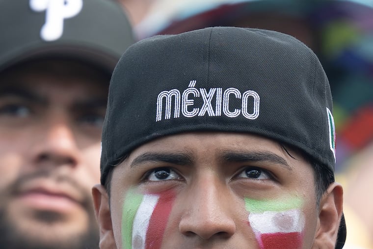 Soccer fans gather to watch Mexico play South Africa on a giant screen during the opening day of the FIFA Fan Festival at Lemon Hill.