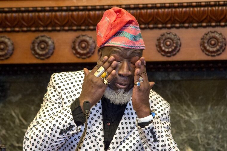 Bassist Jamaaladeen Tacuma wipes away tears after he was presented with the 2018 Benny Golson Award by the mayor at City Hall March 29, 2018. The city kicks off Philly Celebrates Jazz, a celebration of Jazz Appreciation Month in April.