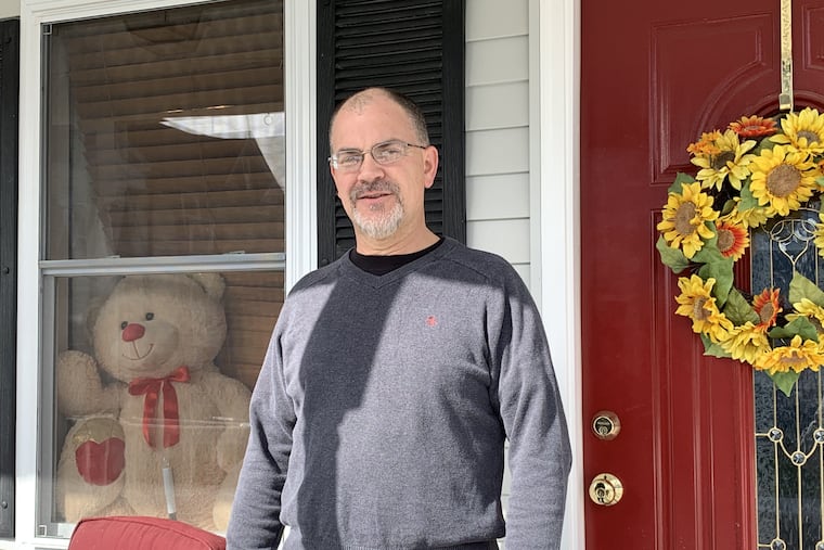 Woodstown High School music teacher and choral director Kahlil Gunther, outside his house, one of many in the county that display a teddy bear for kids to see during coronavirus quarantine. In an effort to spread joy and calm, Gunther has been streaming piano concerts on Saturdays at dinnertime from his home in Woodstown, Salem County.