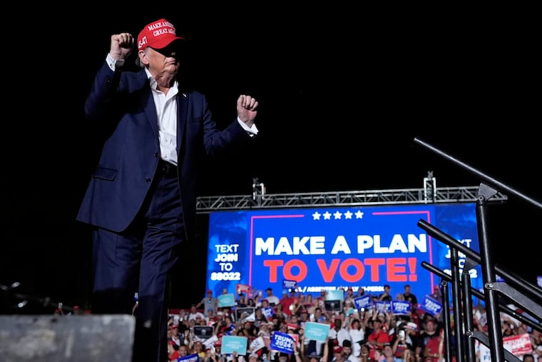 Republican presidential candidate former President Donald Trump dances after speaking at a campaign rally at Trump National Doral Miami on Tuesday in Doral, Fla.