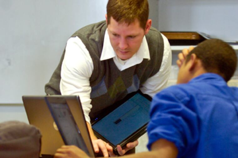 Thomas Gaffey, a math teacher at the School of the Future, instructs his class. (Ron Tarver / Staff Photographer)