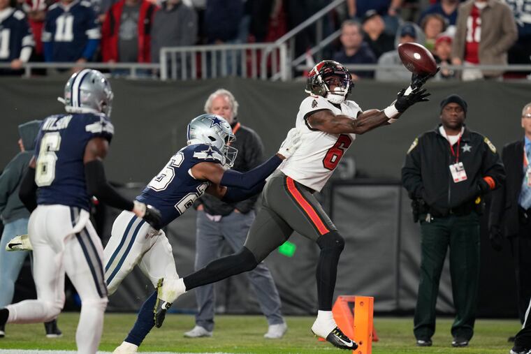 Tampa Bay Buccaneers wide receiver Julio Jones making a touchdown catch against the Dallas Cowboys in a playoff game on Jan. 16, 2023, in Tampa, Fla. (AP Photo/John Raoux)