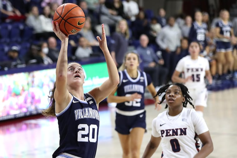 Maddy Siegrist (left) of Villanova goes up for a shot during the first half Thursday at the Palestra. Siegrist finished with a game-high 22 points and 11 rebounds.