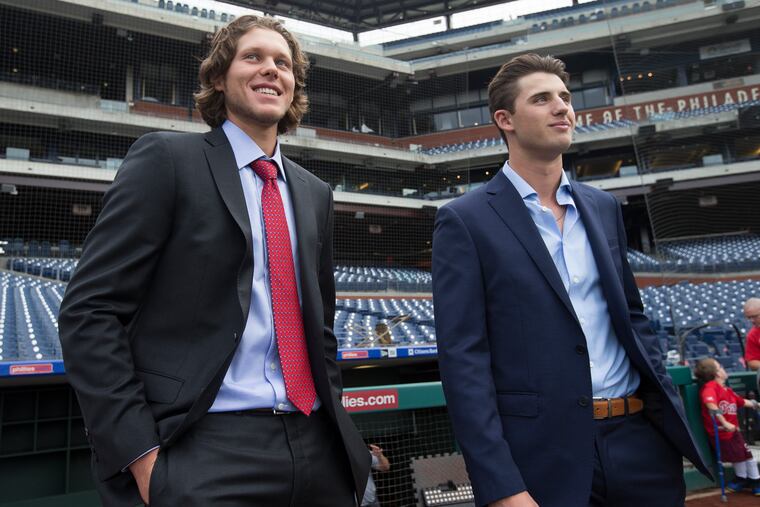 Third baseman Alec Bohn, left, and pitcher Ethan Lindow are the Phillies Paul Owen Award winners as the minor league players of the year. They are shown before the game against the Red Sox at Citizens Bank Park on Sept. 14, 2019.