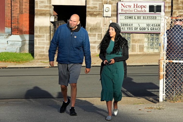 Senator-elect John Fetterman rocked his standard 'fit of shorts and Skechers on an outing with his wife, Gisele, in Braddock, Pa. in November.
