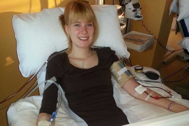 Bone marrow donor Lisa Frömel, shown in a German donor center in Dresden February 2013, goes through the process of donating her bone marrow stem cells for transplantation in Jack Zefutie, an American waiting for the cells at the Hospital of the University of Pennsylvania.