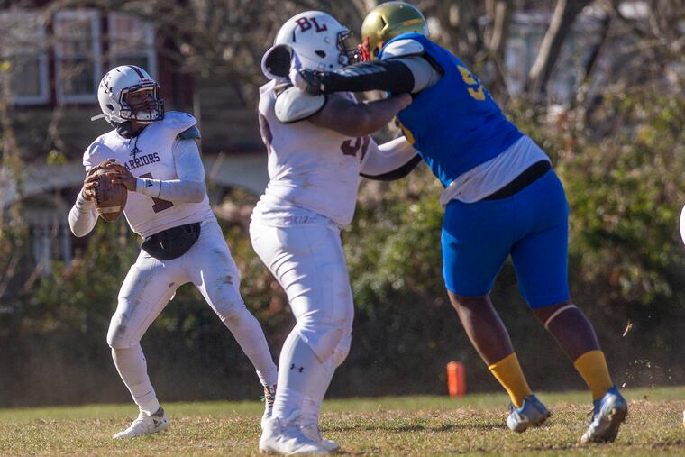 Boys Latin quarterback Malik Johnson looks to throw the ball in the fourth quarter of their Thanksgiving game against Frankford at Frankford Stadium on Thursday, Nov. 22, 2018. Boys Latin won the game, 46-20. HEATHER KHALIFA / Staff Photographer
