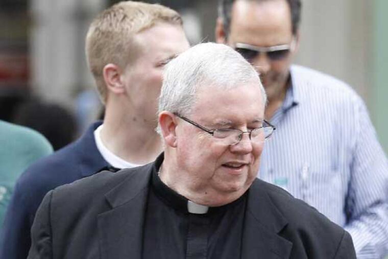Msgr. William J. Lynn leaves the Criminal Justice Center after testifying in a sex-abuse trial on Wednesday, May 23, 2012. ( Yong Kim / Staff Photographer )