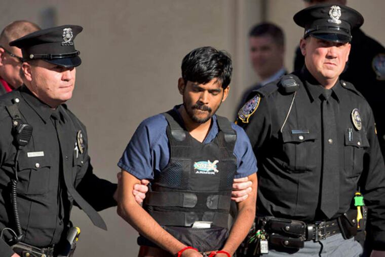Raghunandan Yandamuri , whose trial has been delayed in the October 2012 double homicide, lived in the same apartment complex where the victims were found. MATT ROURKE / AP