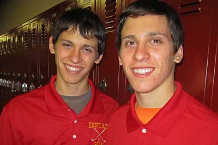 Daniel Spivack (left) and twin brother Jacob helped lead Central High to its sixth straight Public League golf championship. (Matt Breen/Staff)