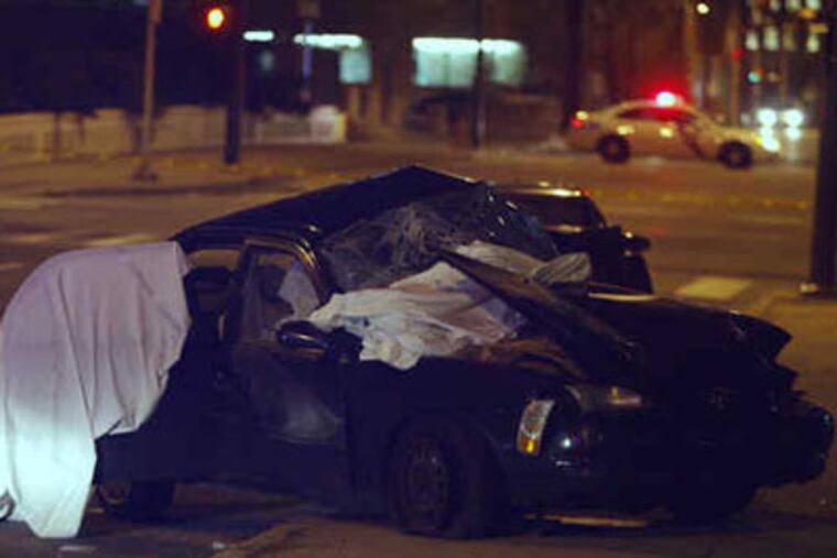 What was left of the car, at 16th & Vine, after the crash that killed Liang Chun Li and Zhi Hua Lin.