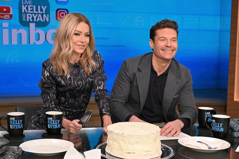 This image released by ABC shows co-host Kelly Ripa, left, and Ryan Seacrest on the set of "Live! With Kelly and Ryan" on Feb. 8.